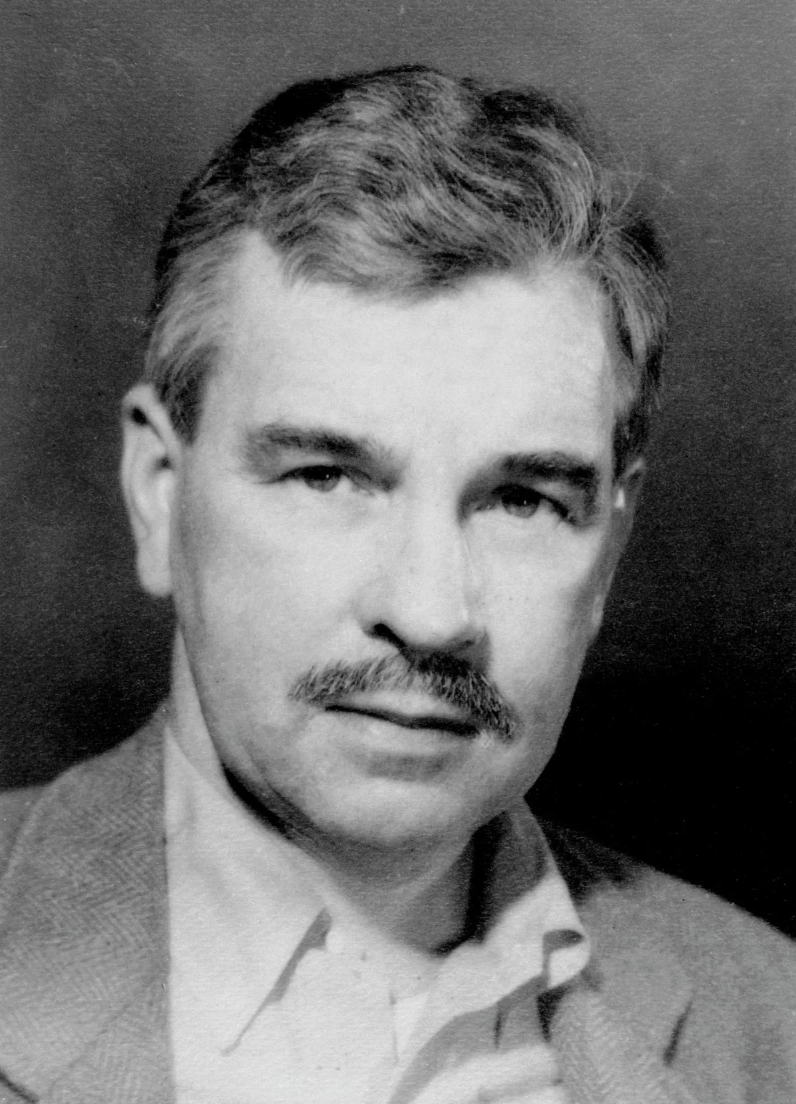 Malcolm Cowley Malcolm Cowley wears an open-collar shirt and a sport coat.