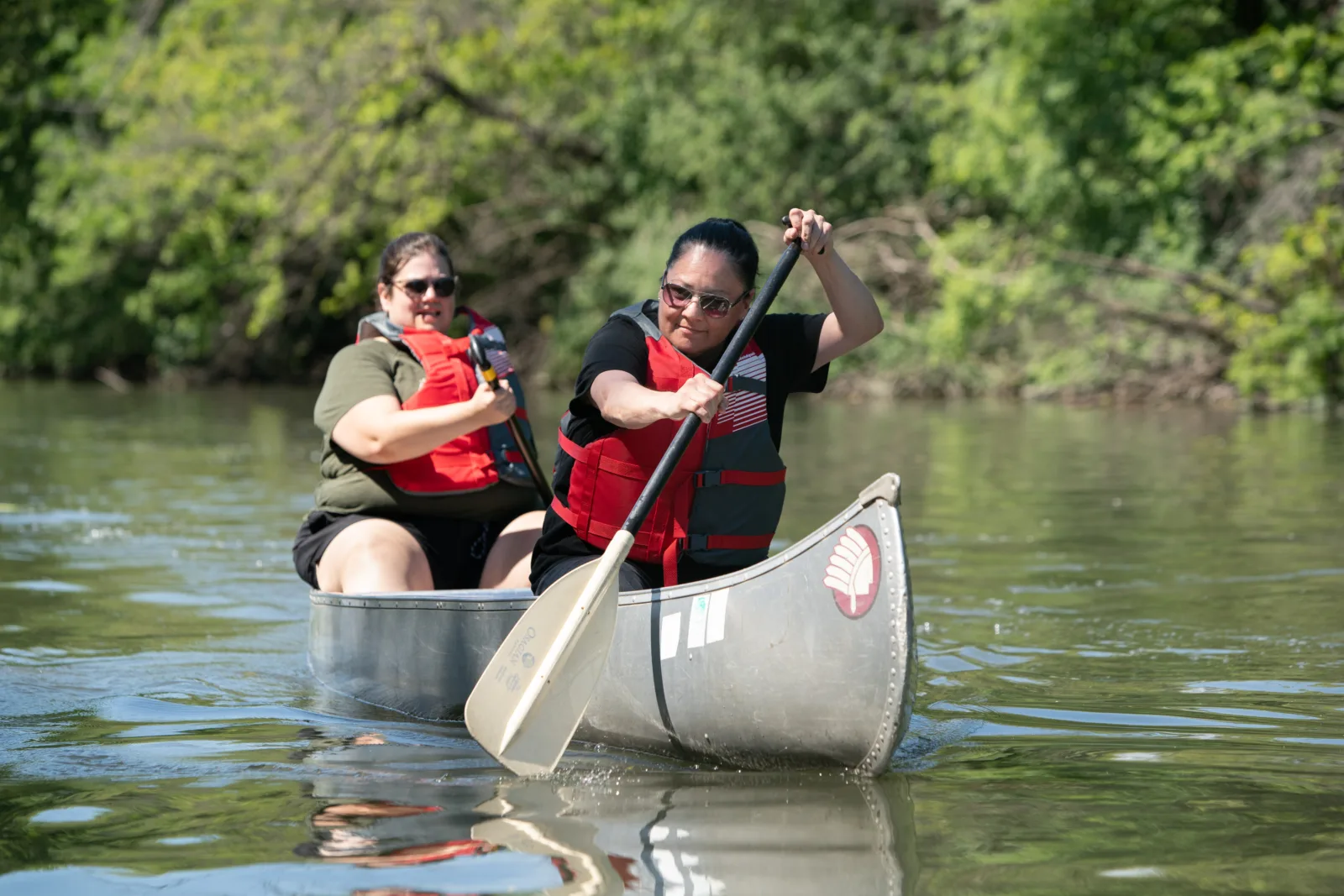 NCAIS participants and instructors paddle down the Chicago River.